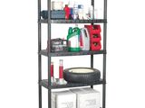 a black shelf with a tire and other items on it