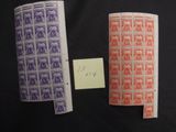 two different stamps are on a black surface with a piece of paper