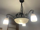 a light that is hanging from the ceiling in the room