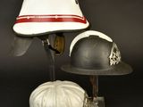 two helmets that are sitting on top of each other