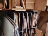 a room with a lot of boxes and boxes on the shelves