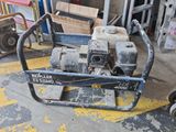 a machine that is sitting on the ground in the garage