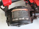 an image of a close up of a cordless nailer