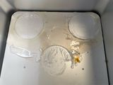an image of a dirty microwave with some food inside of it