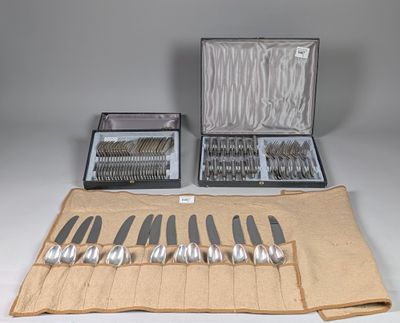 a lot of silverware in a case on a table