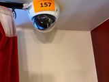 a picture of a security camera mounted on the ceiling