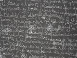 blackboard with a lot of writing on it and a lot of writing on it