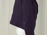 an image of a mannequin wearing a purple jacket