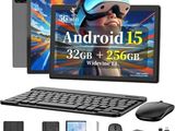 an image of a tablet computer with a keyboard, mouse, mouse and other gadgets