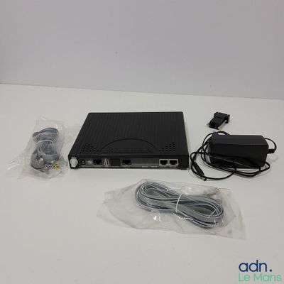 an image of a laptop computer with a power cord and charger