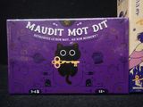 purple box with a picture of a cat holding a key in it ' s mouth and a purple box with a picture of a cat holding a key in it '