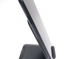 a close up of a cell phone on a stand