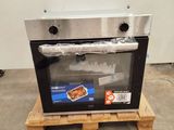an image of a microwave sitting on a pallet