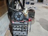 a machine that is sitting on the ground in a garage