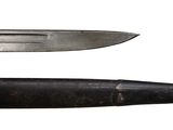 two different types of knives on a white background