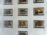 a picture of a sheet of postage stamps on a sheet of paper