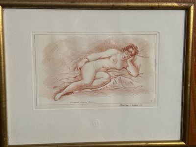 tableau représentant une femme nue allongée sur un lit, dans un cadre doré