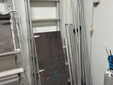 a room with a lot of metal items on the floor