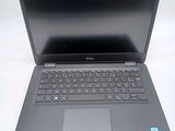 a laptop computer that is sitting on a table