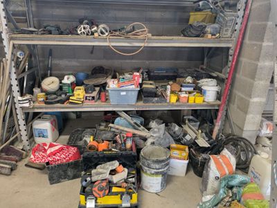 a garage filled with lots of tools and supplies