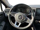 the steering wheel and dashboard of a car is shown in this image