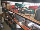 many different types of electronics on the shelves in this room