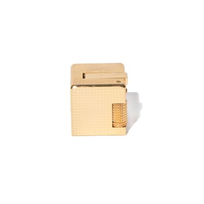 an image of a small box with a handle on a white surface