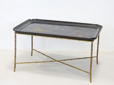 an image of a black and gold tray on a gold stand
