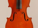 an orange violin with a black bow on a white background