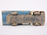 a toy train that is sitting on a white surface