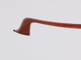 the handle of a wooden stick with a wooden handle on a white background