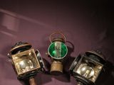 three different types of lamps are on a purple surface