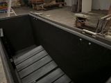 an image of a large black box in a warehouse