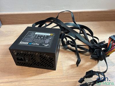 a close up of a computer power supply sitting on a table