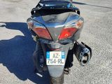 a motorcycle that is parked in a parking lot