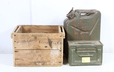 two old wooden boxes and a metal canister sitting next to each other