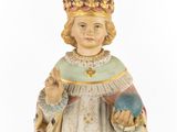 an image of a statue of a woman holding a globe in her hand