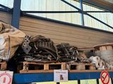 a large amount of junk on the shelves in the warehouse