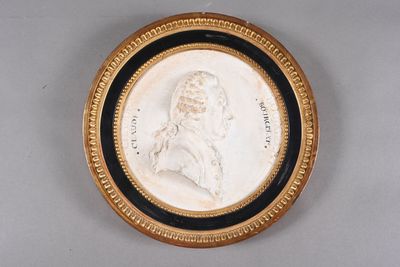 an antique portrait of a woman in a black and gold frame
