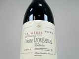a bottle of wine that is sitting on a table
