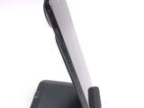 a close up of a cell phone on a stand