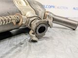 an image of a close up of a exhaust pipe on a table