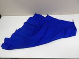 a pair of blue pants sitting on top of a white table