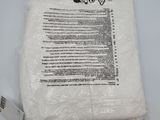 a bag of white tissue sitting on top of a table