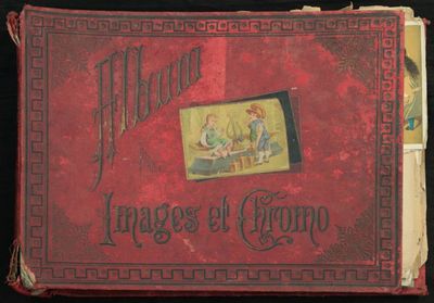 un vieux livre rouge sur lequel figure l'image d'un homme et d'une femme