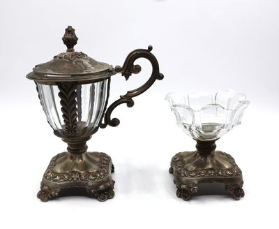 pair of antique silver plated teapots and a glass bowl