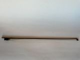 an image of a long wooden stick on a white surface
