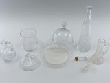 a lot of glass items that are on the table