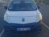 a picture of a white van parked in a parking lot