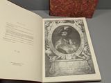 an open book with a picture of a man on it